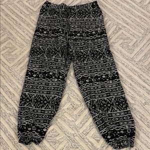 Black & white harem style pants.